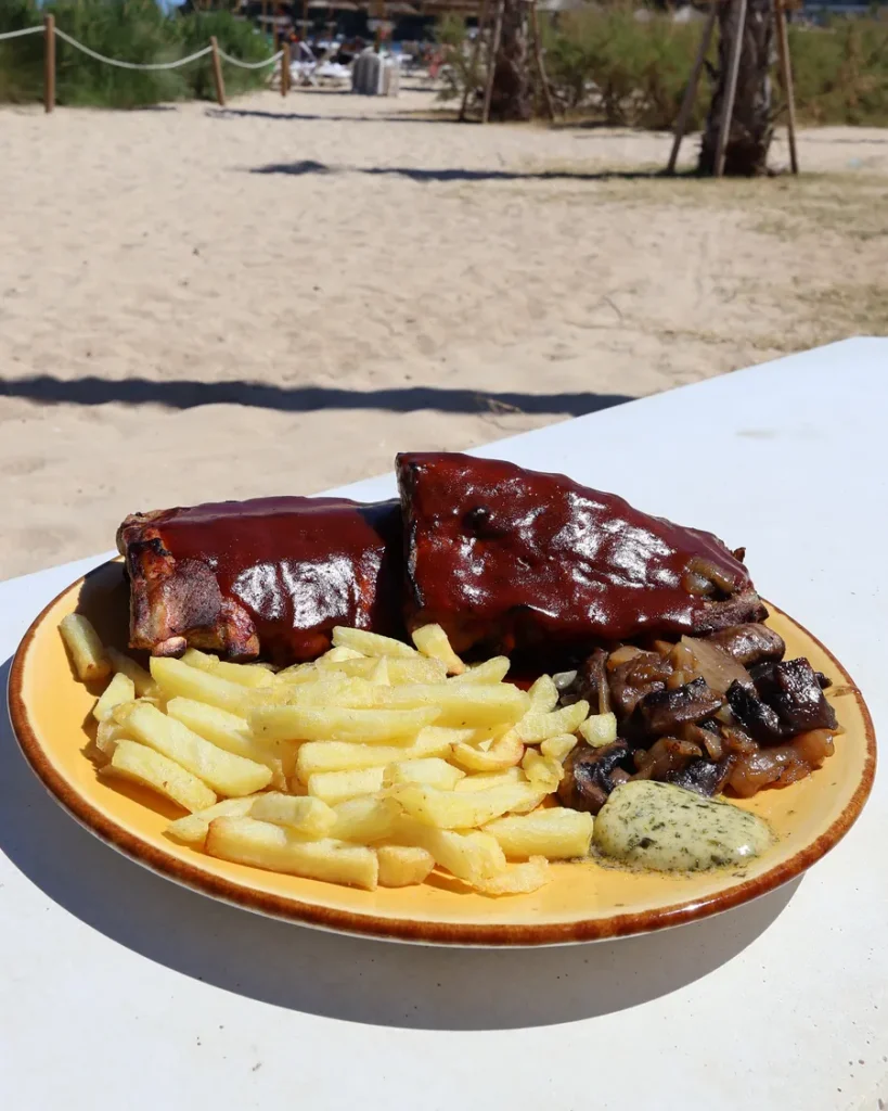 BBQ ribs with fries and mushrooms